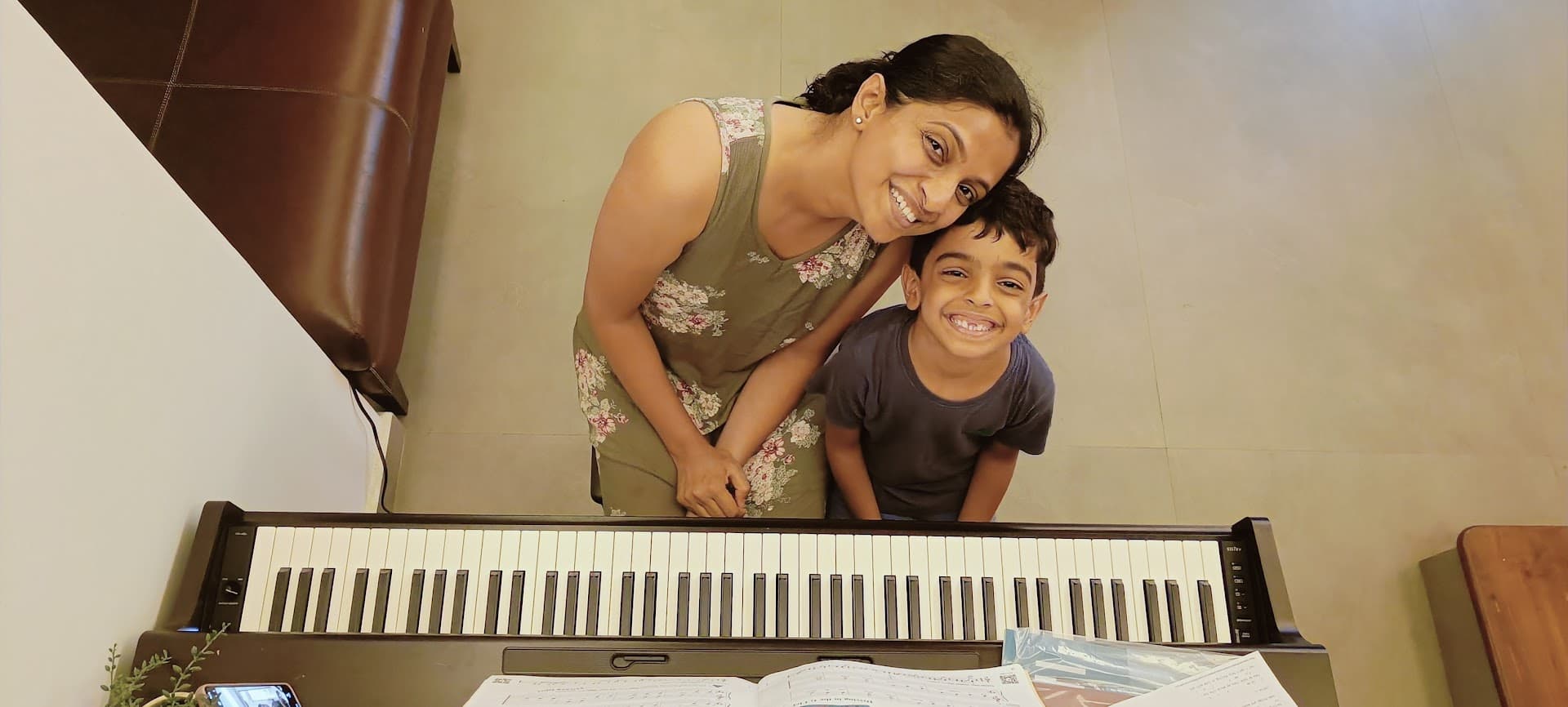 At the piano